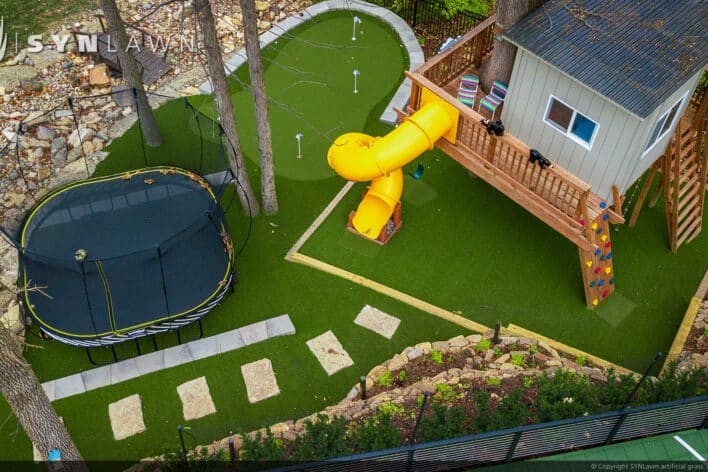 SYNLawn Nebraska residential backyard treehouse trampoline